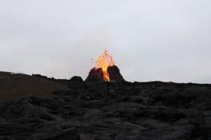 Geldinadalir volcano spewing lava on the horizon
