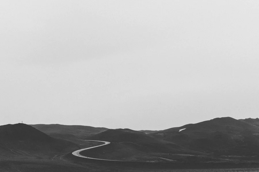 A winding road leading into the Icelandic Highlands