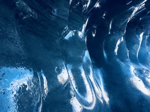 The inside of a blue ice cave in Iceland