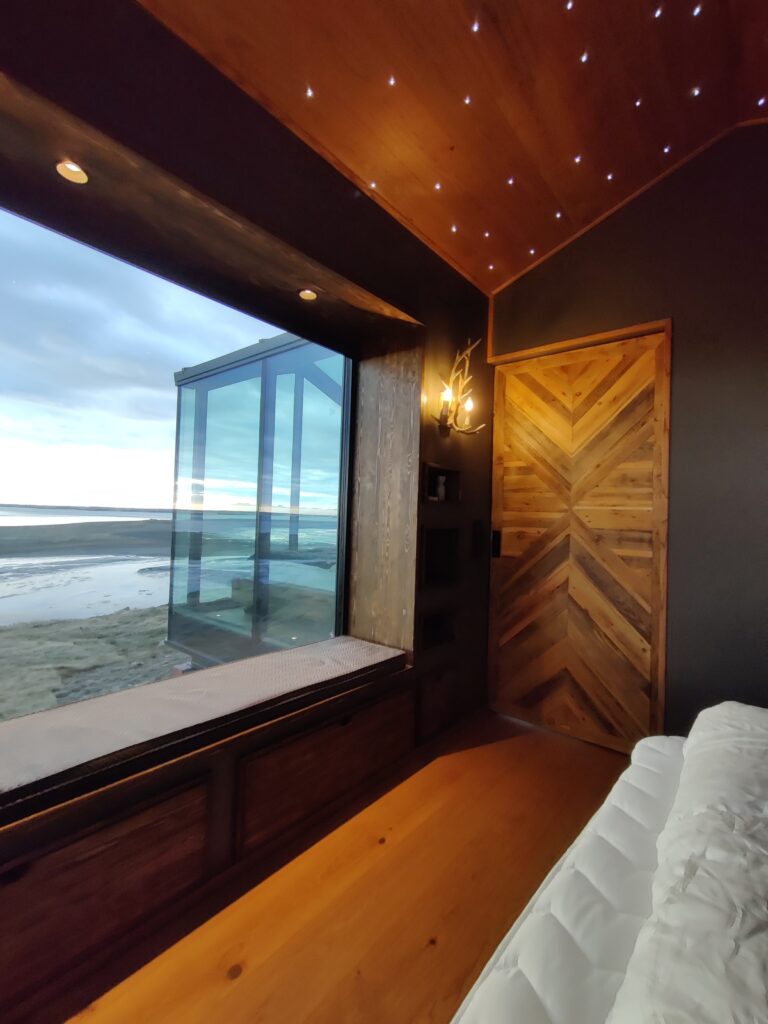 frigg panorama glass lodge iceland second bedroom view to ocean