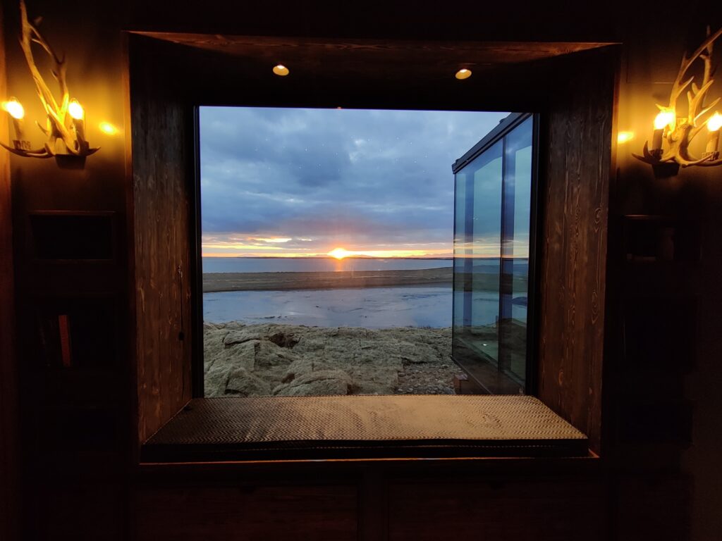 panorama glass lodge west ocean view window bench