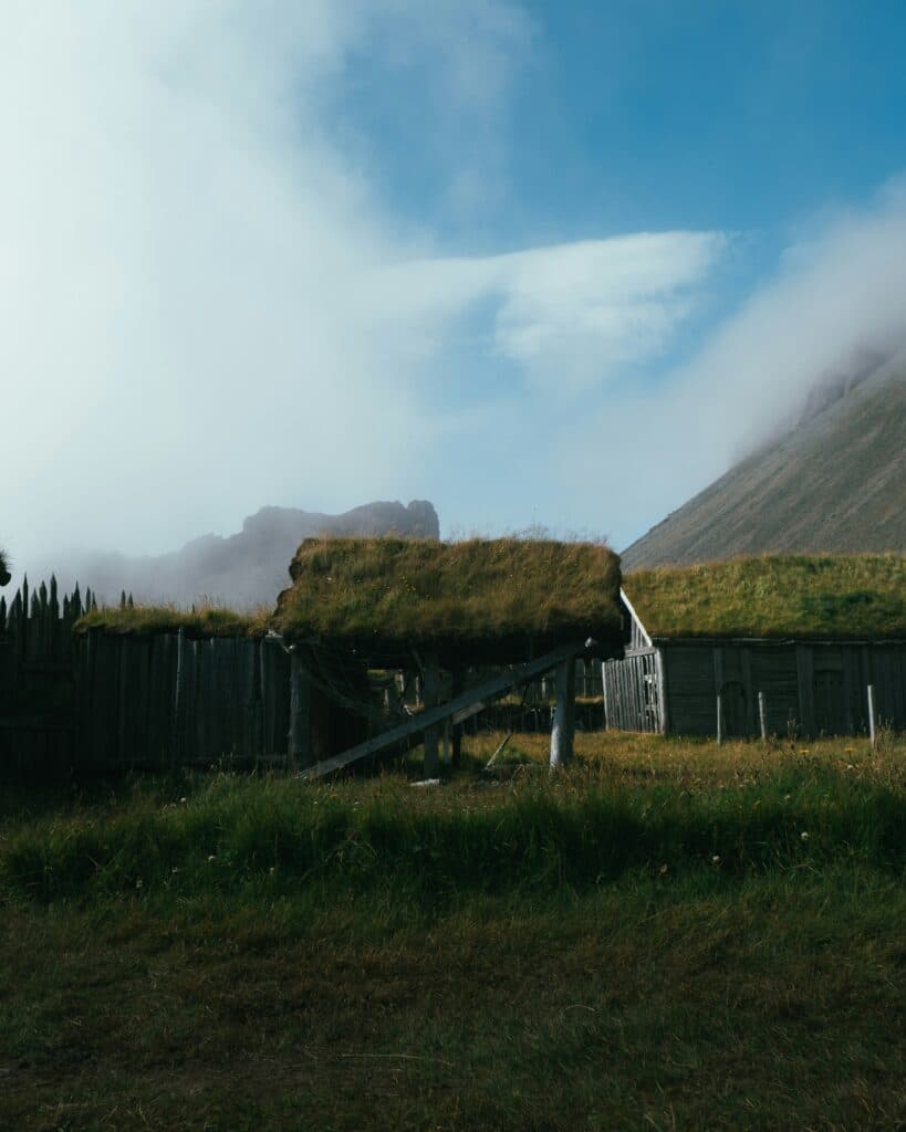 A turfhouse in Iceland under a blue sky